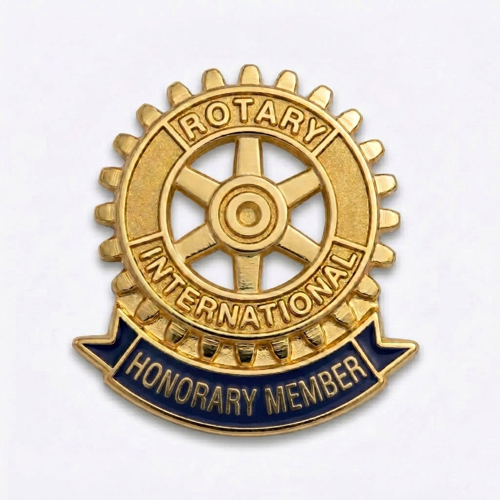 Insigna pin metalica decupata pentru titlul de Honorary Member in clubul Rotary, realizata din metal stantat si placata cu aur de 24k.